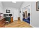 Home office with hardwood floors and a view into the bedroom at 1327 Hosea L Williams Se Dr, Atlanta, GA 30317