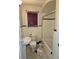 Bathroom featuring a bathtub, toilet, pedestal sink and red and white tile at 1643 Westhaven Sw Dr, Atlanta, GA 30311