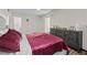 Main bedroom with plush bedding and ample closet space at 6851 Roswell Rd # F35, Atlanta, GA 30328