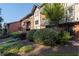 Side view of the brick building with landscaping at 6851 Roswell Rd # F35, Atlanta, GA 30328