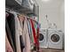 Convenient laundry room with washer, dryer and shelving at 6851 Roswell Rd # F35, Atlanta, GA 30328