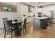 Modern kitchen with white cabinets and large island at 775 Stickley Oak Way, Woodstock, GA 30189