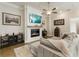 Spacious living room featuring a fireplace and large TV at 775 Stickley Oak Way, Woodstock, GA 30189