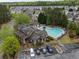 Heart-shaped pool with clubhouse and parking at 775 Stickley Oak Way, Woodstock, GA 30189