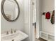 Convenient powder room with pedestal sink and built-in bench at 775 Stickley Oak Way, Woodstock, GA 30189