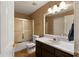 Bathroom with shower/tub combo, vanity, and linen closet at 51 Willow Bend Nw Dr, Cartersville, GA 30121