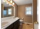 Bathroom with double vanity, large mirror, and tile flooring at 51 Willow Bend Nw Dr, Cartersville, GA 30121