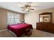 Main bedroom with king-size bed and dresser with mirror at 51 Willow Bend Nw Dr, Cartersville, GA 30121