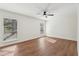 Spacious bedroom with ceiling fan and wood flooring at 622 Powers Ferry North Se, Marietta, GA 30067