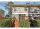 Wooden deck with stairs leading to backyard at 622 Powers Ferry North Se, Marietta, GA 30067