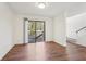 Bright dining room with wood floors and access to deck at 622 Powers Ferry North Se, Marietta, GA 30067