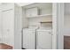 Convenient laundry area with washer and dryer in unit at 622 Powers Ferry North Se, Marietta, GA 30067