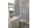 Modern bathroom with white vanity, toilet and shower at 4664 Ryan Rd, Conley, GA 30288