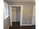 Bedroom with bifold doors leading to a spacious closet at 4664 Ryan Rd, Conley, GA 30288