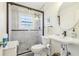 Updated bathroom with marble shower and pedestal sink at 885 Briarcliff Ne Rd # 21, Atlanta, GA 30306