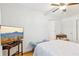 Bedroom with hardwood floors, ceiling fan, and a TV at 885 Briarcliff Ne Rd # 21, Atlanta, GA 30306