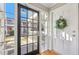 Front door with glass panes and a wreath at 885 Briarcliff Ne Rd # 21, Atlanta, GA 30306
