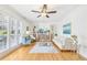 Hardwood floors, comfy seating, and a ceiling fan at 885 Briarcliff Ne Rd # 21, Atlanta, GA 30306