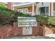 Outdoor kitchen area with built-in stainless steel grill and brick surround at 885 Briarcliff Ne Rd # 21, Atlanta, GA 30306