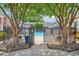 Gated community pool with lounge chairs and manicured landscaping at 885 Briarcliff Ne Rd # 21, Atlanta, GA 30306