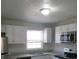 Modern kitchen with white cabinets and stainless steel appliances at 2491 Crestdale Se Cir, Atlanta, GA 30316