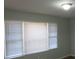 Bright living room with large windows and neutral walls at 2491 Crestdale Se Cir, Atlanta, GA 30316