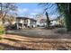 Large backyard with mature trees and two houses visible at 226 Collum Nw St, Atlanta, GA 30314