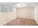 Spacious finished basement area with carpet and large windows at 226 Collum Nw St, Atlanta, GA 30314