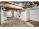 Unfinished basement with tiled floor and exposed utilities at 226 Collum Nw St, Atlanta, GA 30314