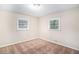 Well-lit bedroom with neutral decor and carpeted floors at 226 Collum Nw St, Atlanta, GA 30314