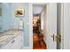 Elegant bathroom with granite countertop and white cabinetry at 23 Paces West Dr, Atlanta, GA 30327