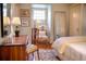 Bedroom with hardwood floors and antique furniture at 23 Paces West, Atlanta, GA 30327