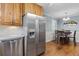 Kitchen with stainless steel appliances and wood cabinets at 3251 Wanda Woods Dr, Atlanta, GA 30340