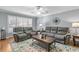 Relaxing living room with grey sofas, coffee table, and hardwood floors at 3251 Wanda Woods Dr, Atlanta, GA 30340