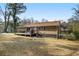 Brick ranch house with deck and large backyard at 4163 Citizen Cir, Austell, GA 30106