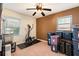 Versatile bedroom used as a home gym with an elliptical at 4163 Citizen Cir, Austell, GA 30106