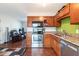 Modern kitchen with stainless steel appliances and wood cabinets at 4163 Citizen Cir, Austell, GA 30106