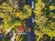 Aerial view showcasing home's location in a wooded neighborhood at 1921 Westwood Sw Ave, Atlanta, GA 30310