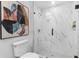 Updated bathroom featuring a frameless shower and modern fixtures at 1921 Westwood Sw Ave, Atlanta, GA 30310