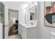 Double vanity bathroom with a view into bedroom at 1921 Westwood Sw Ave, Atlanta, GA 30310