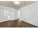 Bright bedroom with hardwood floors and double door closet at 1921 Westwood Sw Ave, Atlanta, GA 30310