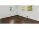 Bright bedroom with hardwood floors and large windows at 1921 Westwood Sw Ave, Atlanta, GA 30310