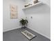Bright laundry room with shelving and stylish flooring at 1921 Westwood Sw Ave, Atlanta, GA 30310