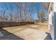 Spacious backyard with a large patio area at 1990 Old Concord Se Dr, Covington, GA 30016