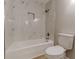 Clean bathroom featuring a bathtub and shower at 1990 Old Concord Se Dr, Covington, GA 30016