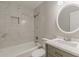 Modern bathroom with marble tile and updated fixtures at 1990 Old Concord Se Dr, Covington, GA 30016