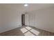 Simple bedroom with hardwood floors and a window at 1990 Old Concord Se Dr, Covington, GA 30016