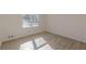 Simple bedroom with hardwood floors and a window at 1990 Old Concord Se Dr, Covington, GA 30016