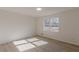 Spacious bedroom featuring wood-look floors and sunlight at 1990 Old Concord Se Dr, Covington, GA 30016