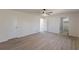 Large bedroom with wood-look floors and multiple closets at 1990 Old Concord Se Dr, Covington, GA 30016